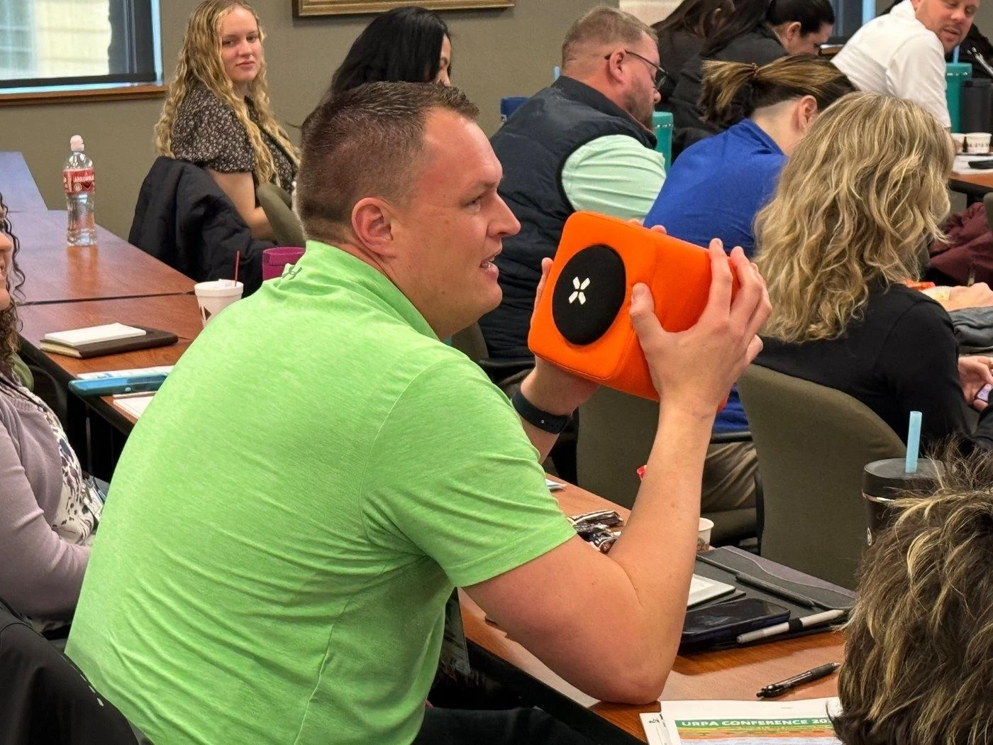Wireless microphone in use at a corporate event produced by SwissMixx Audio, Treasure Valley Idaho