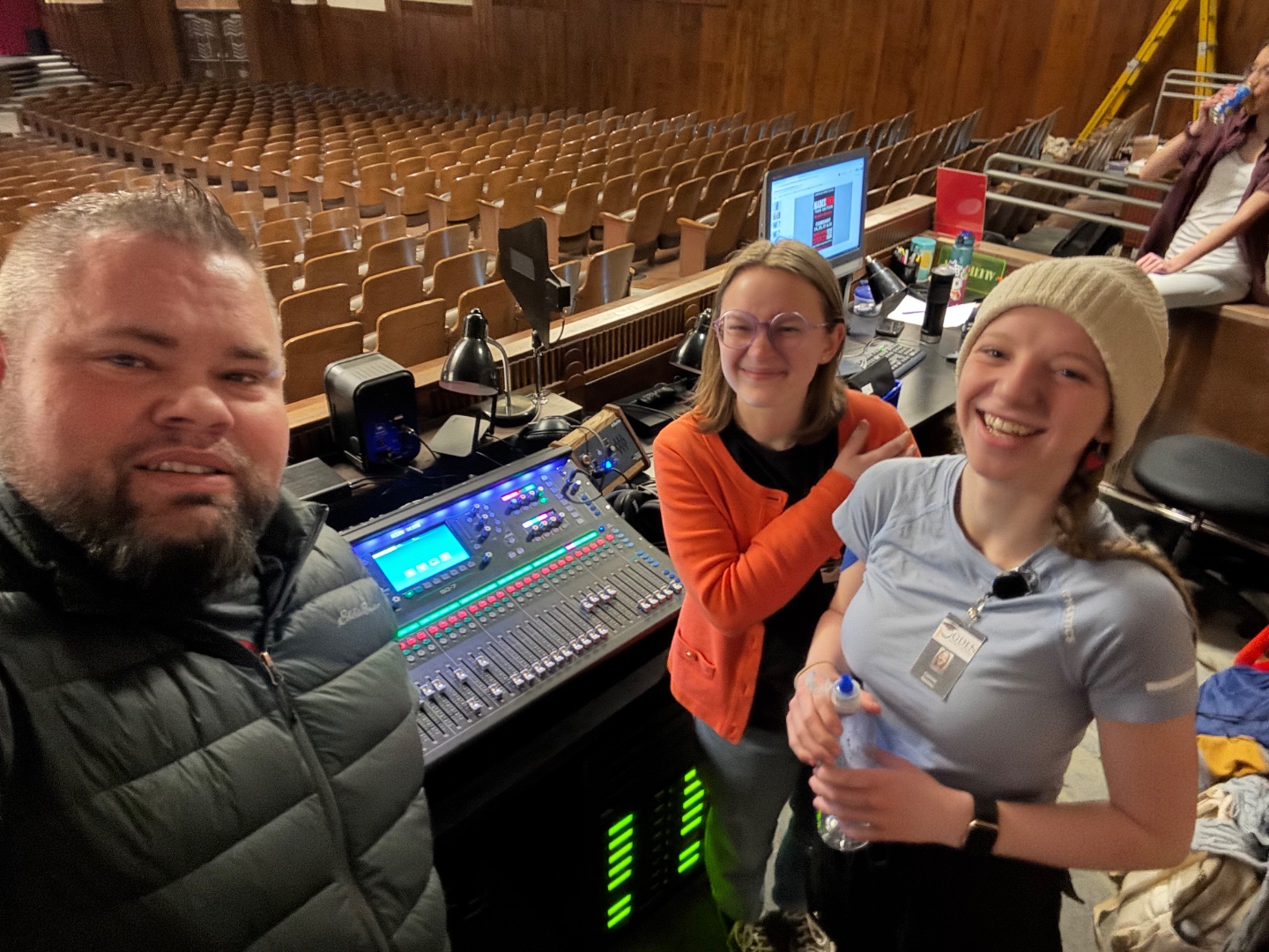 Mark with students at Midas mixing console in school auditorium, youth audio education Treasure Valley Idaho