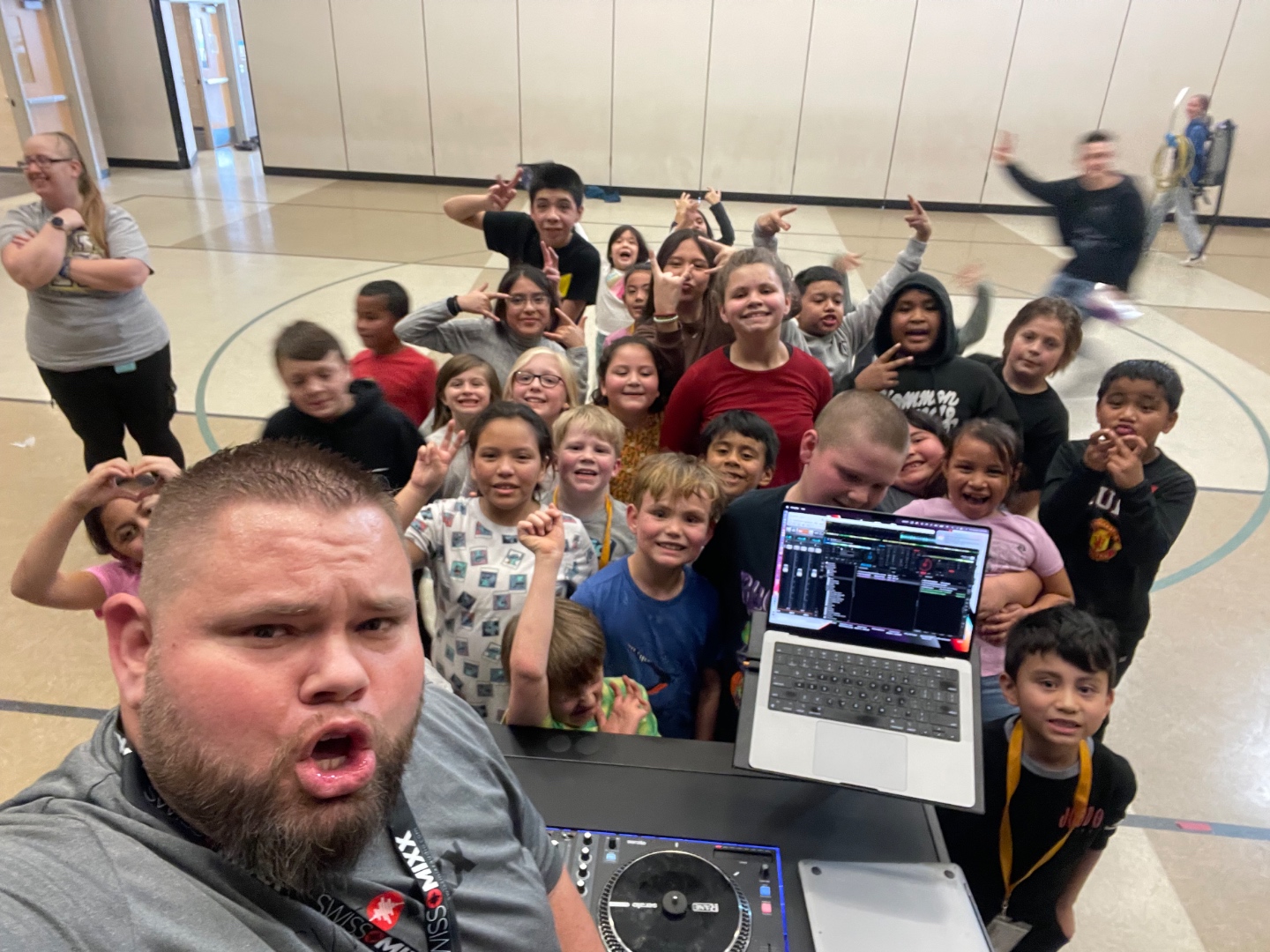 Mark with elementary school class at DJ and audio setup in school gym, audio education program Treasure Valley Idaho