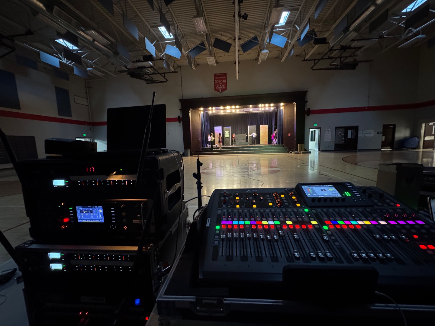 Front of house position looking toward school stage during rehearsal, SwissMixx Audio production setup Boise Idaho