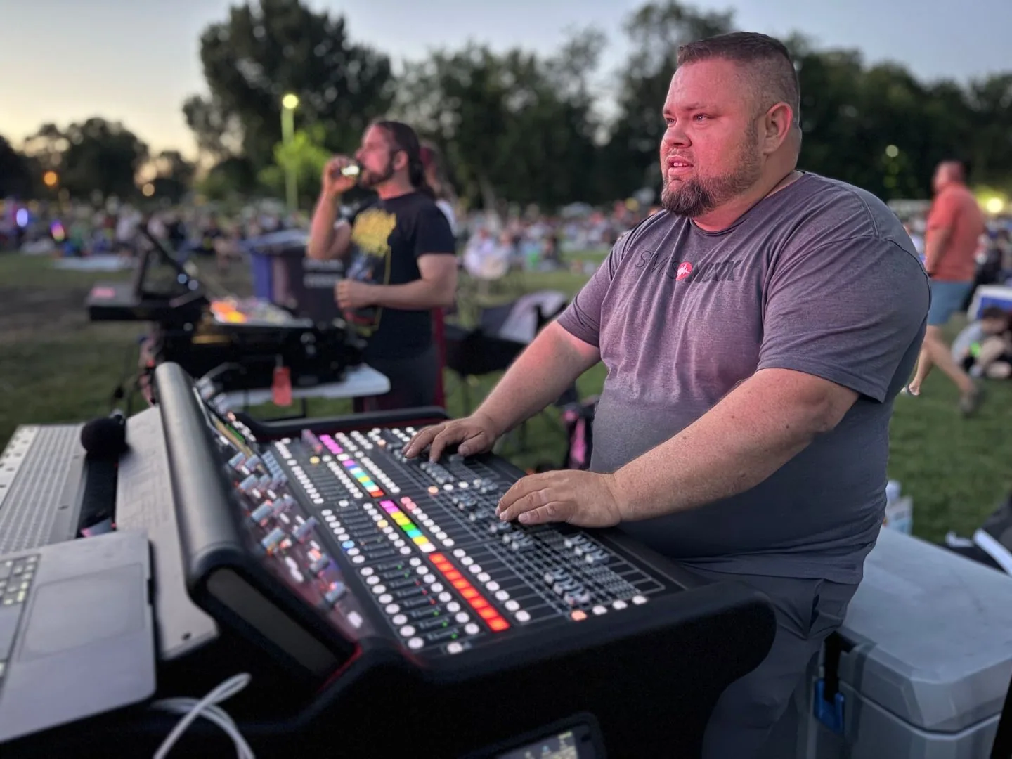 Mark Christiansen mixing at an outdoor console, SwissMixx Audio home base in Nampa Idaho