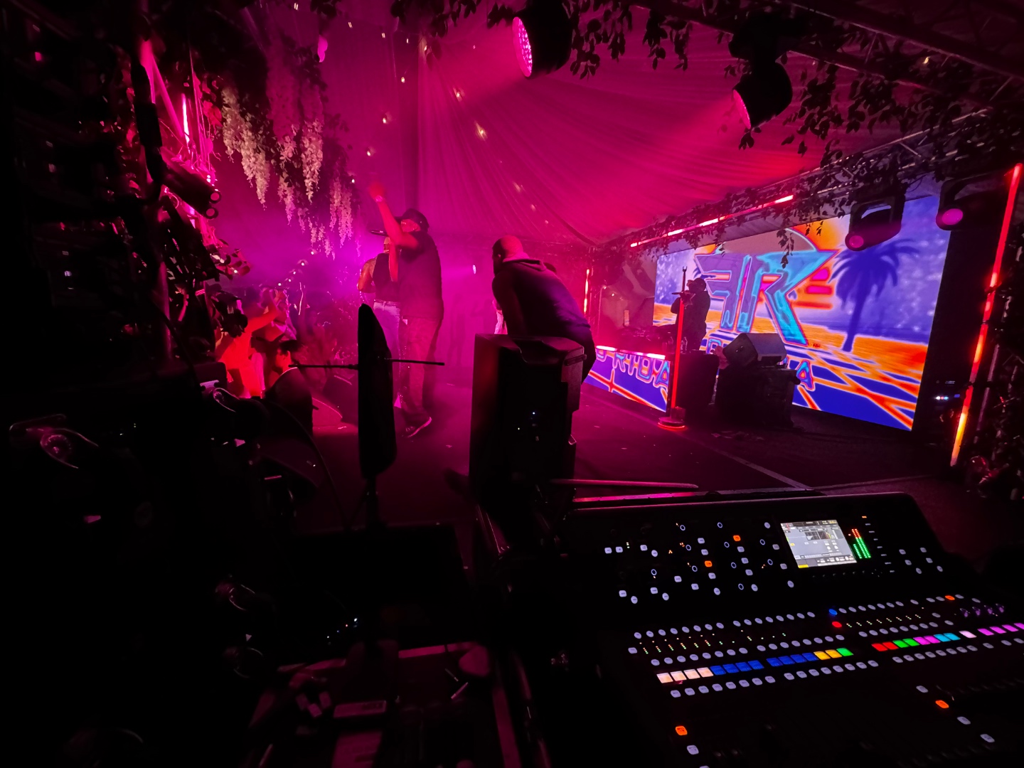 Mark Christiansen at the FOH mixing console during a Flo Rida live show, SwissMixx Audio live sound production