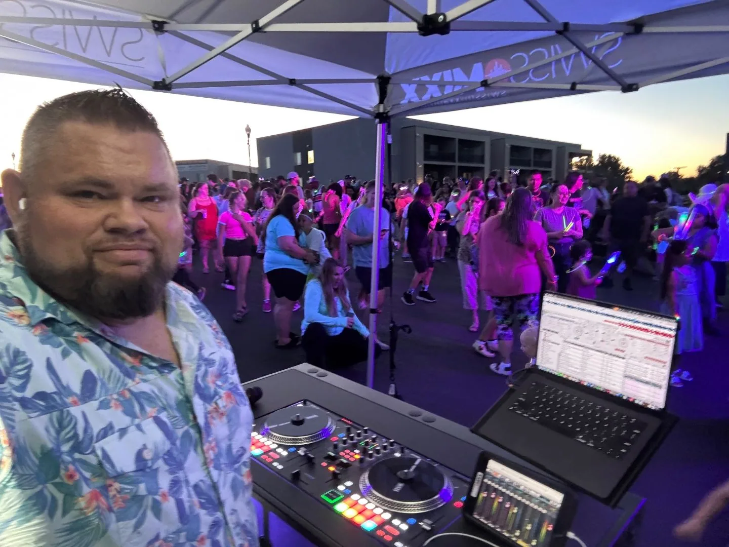 Crowd at a glow party event with professional DJ lighting and sound by SwissMixx Audio near Garden City Idaho
