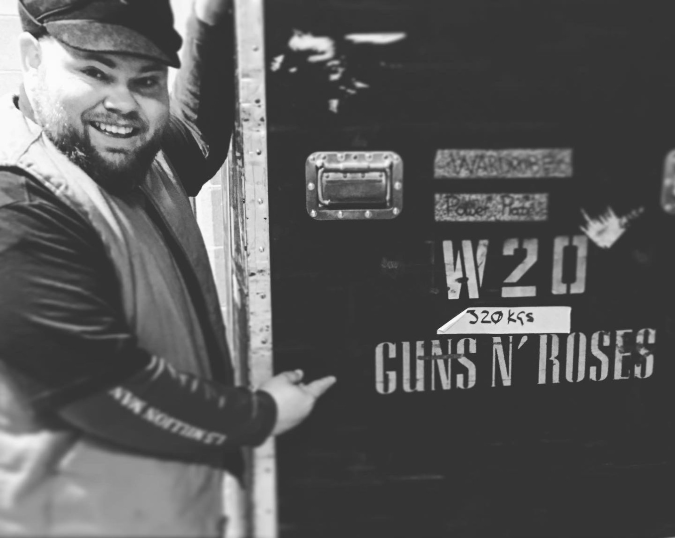 Mark Christiansen backstage next to a Guns N Roses official tour road case, SwissMixx Audio live event sound