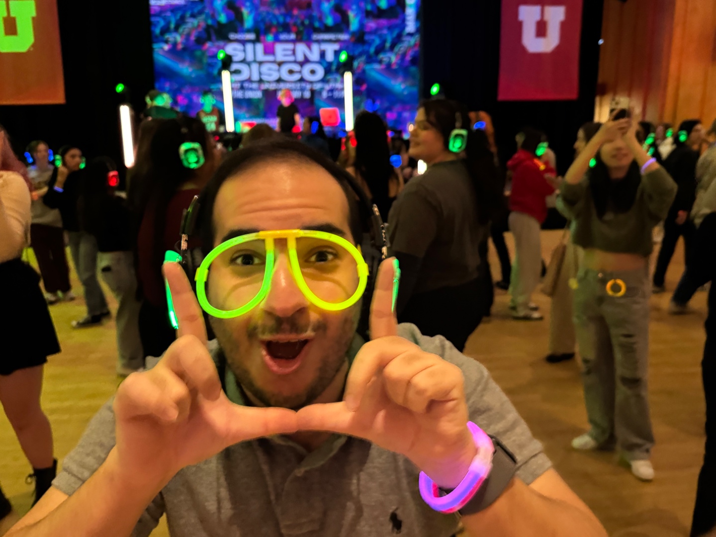 Silent disco event crowd at University of Utah wearing LED headsets and dancing, SwissMixx Audio production Treasure Valley Idaho