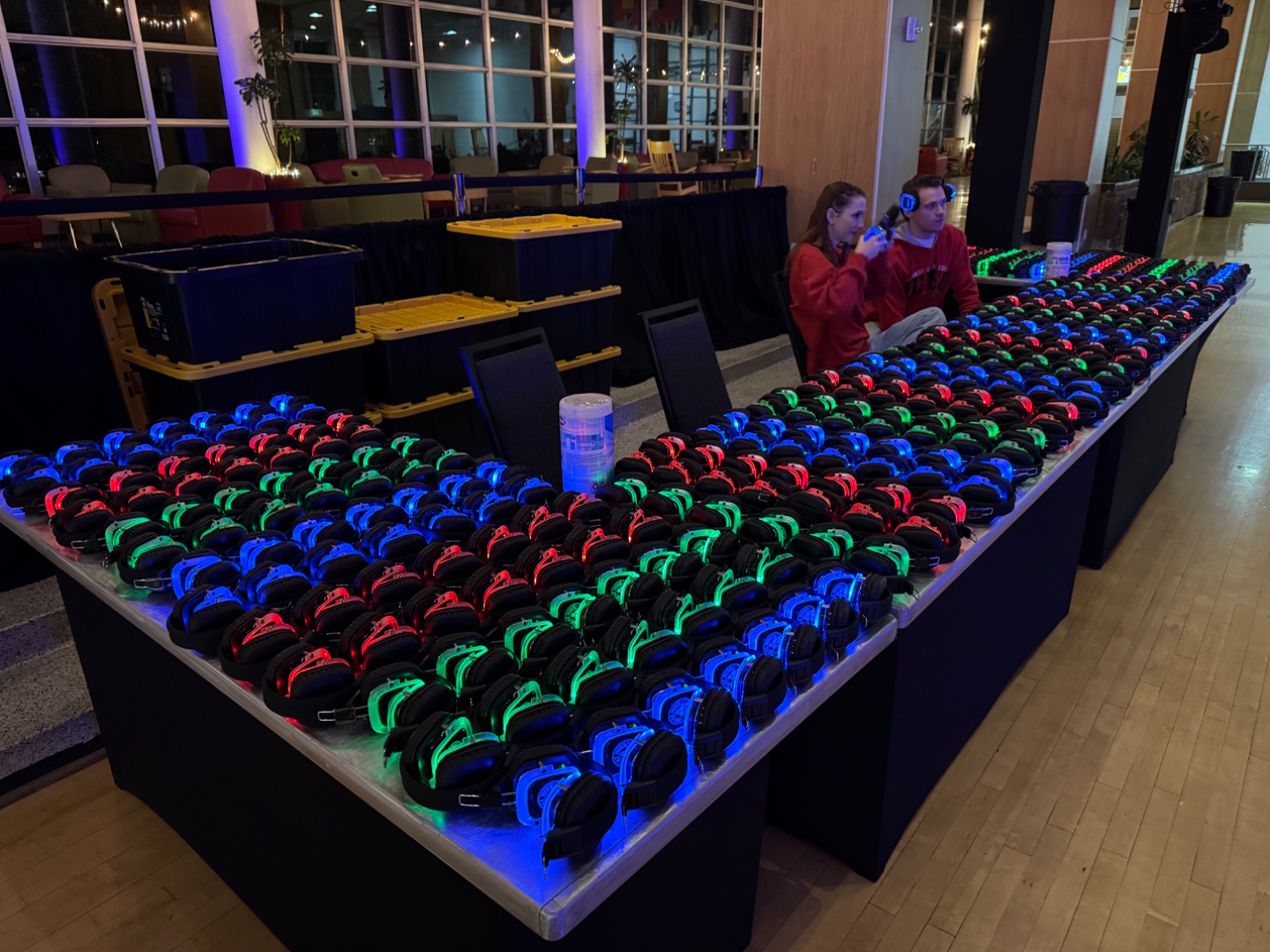 SwissMixx Audio full fleet of hundreds of 3-color LED silent disco wireless headsets laid out for up to 750 guests event, rental in Boise Idaho Treasure Valley