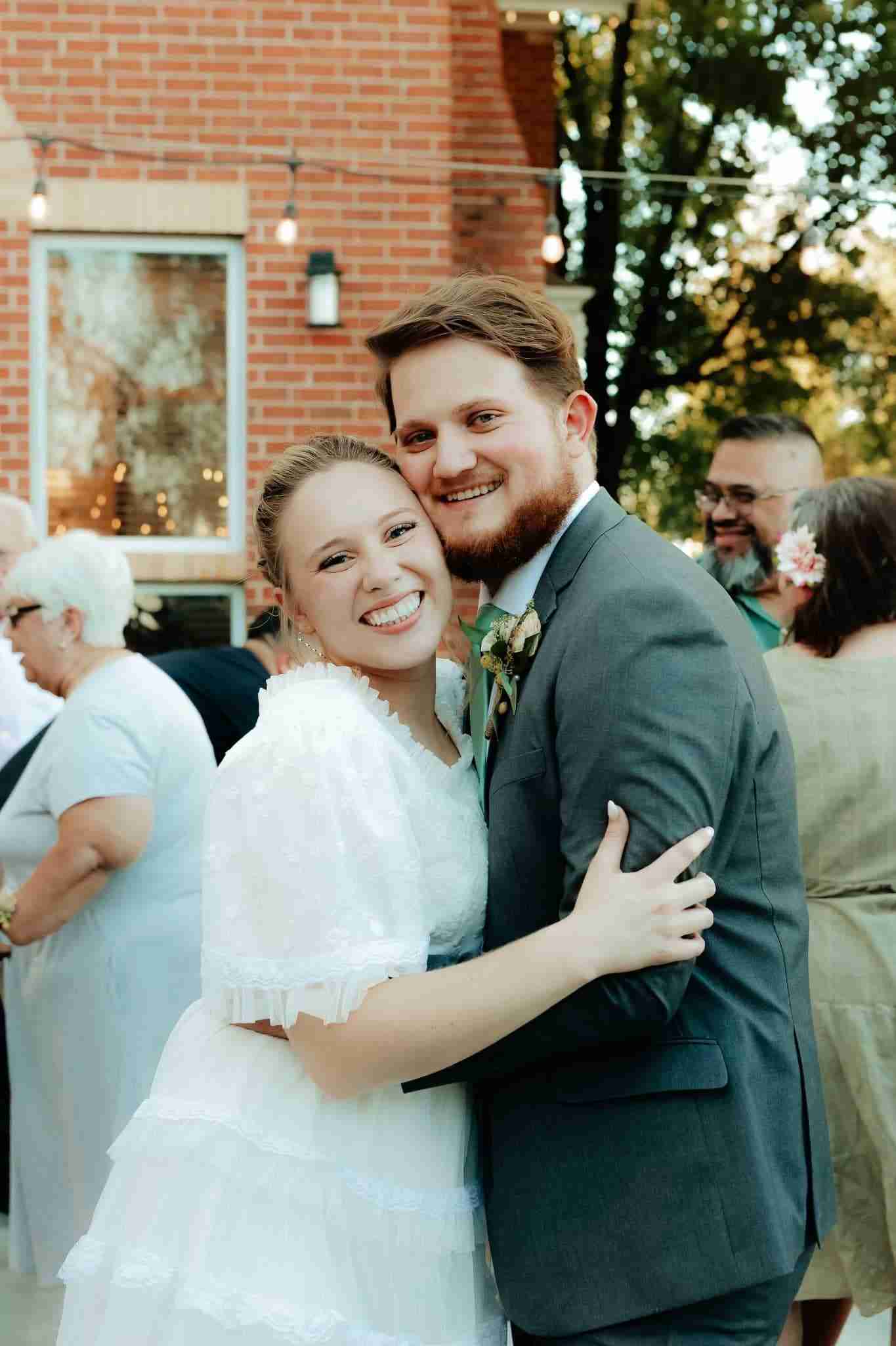 Wedding couple sharing an embrace at an Idaho Treasure Valley wedding reception
