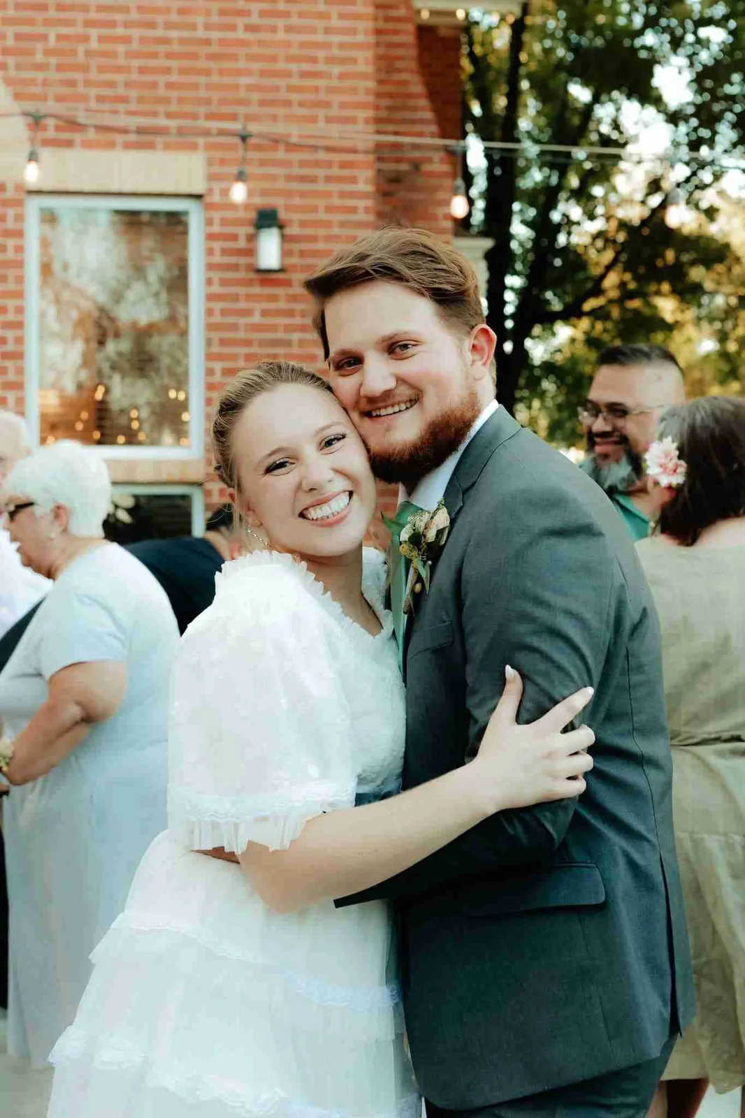 Couple embracing at an elegant destination wedding with professional sound by SwissMixx Audio